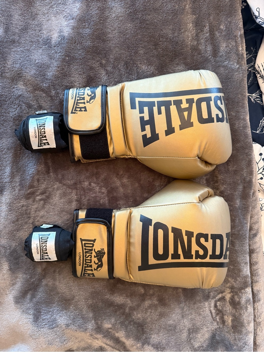 Like New Lonsdale boxing gloves- 12 oz gold and black with hand wraps
